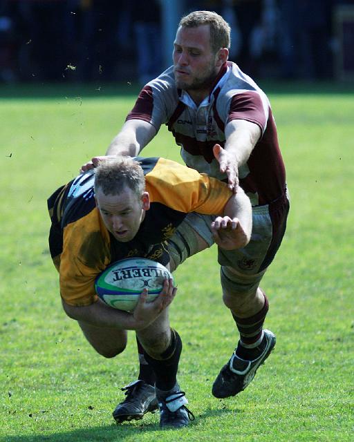 Cornwall captain Ryan Western gets dumped to the ground.jpg - Cornwall captain Ryan Westren gets dumped to the ground. Photo by John Beach.